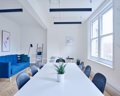 A modern editorial office space with natural light